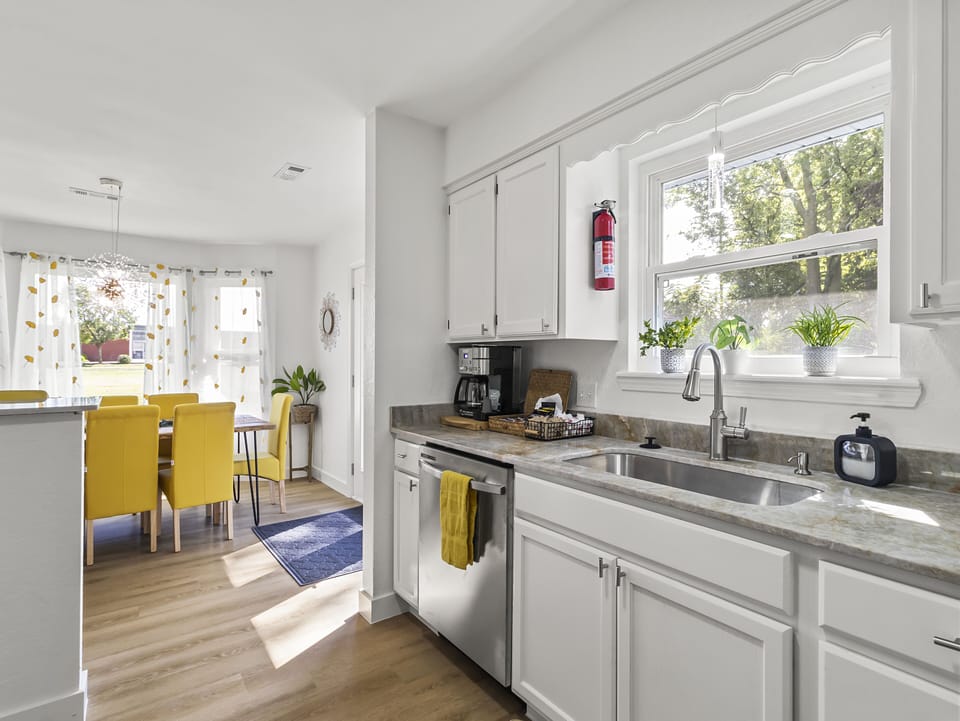 Our bright, beautiful kitchen, with natural stone quartzite countertops.