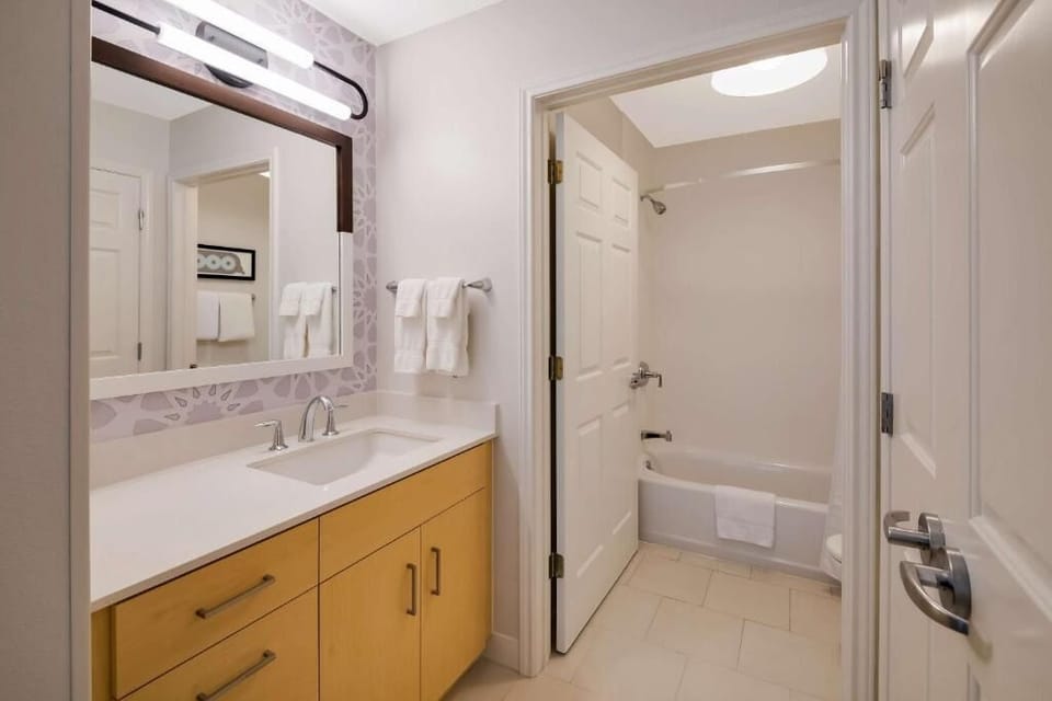 Refresh after adventures in a bright bath with tub-shower combo.