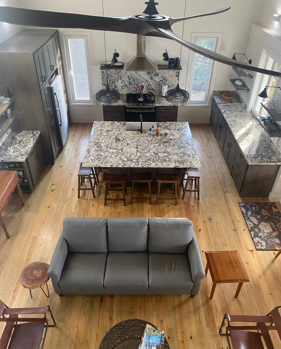 A view from the loft.  Granite everywhere, stainless appliances including a DW. 