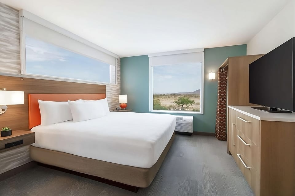 Stretch out on crisp linens with entertainment right at hand.