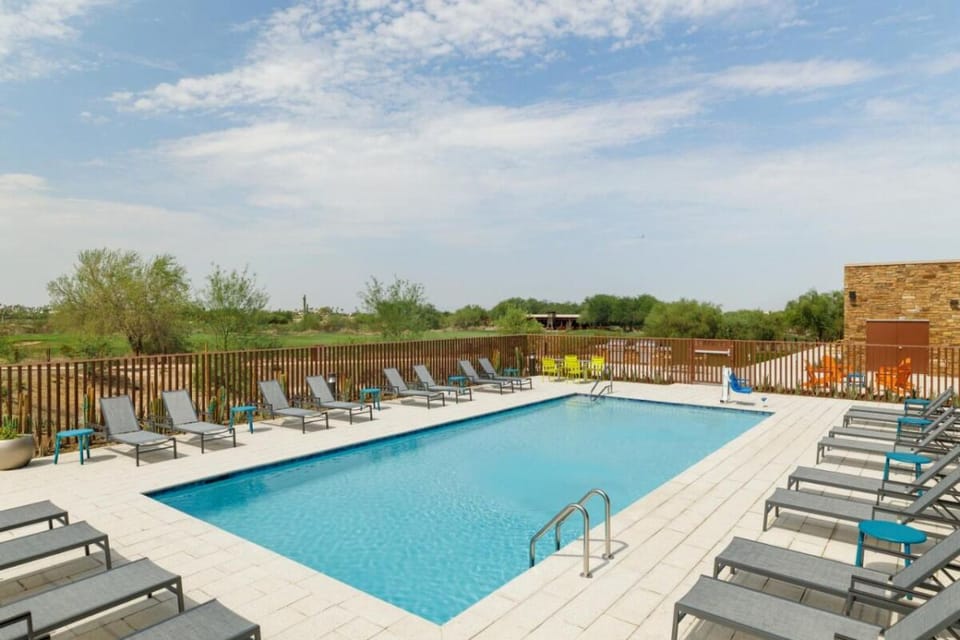 Dive into a sparkling pool and lounge under open skies.