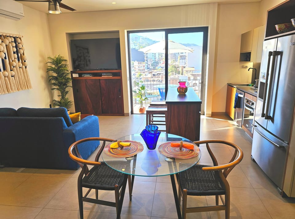 Spacious and bright layout of the living room, kitchen and dining
