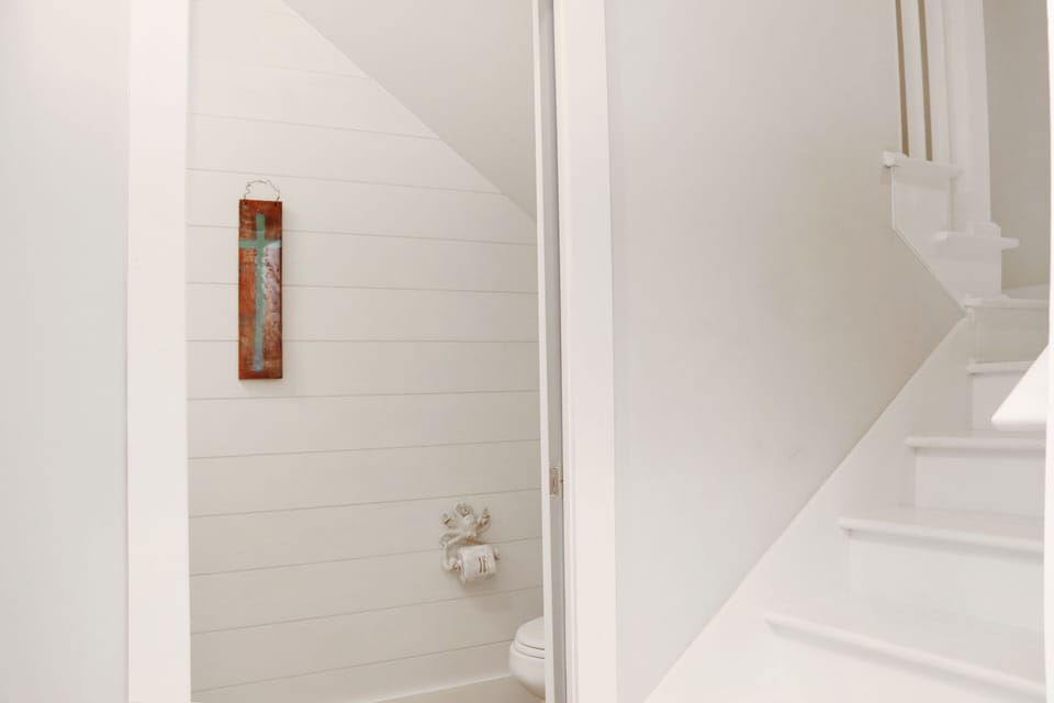 Half Bath with Stairs to Second Floor