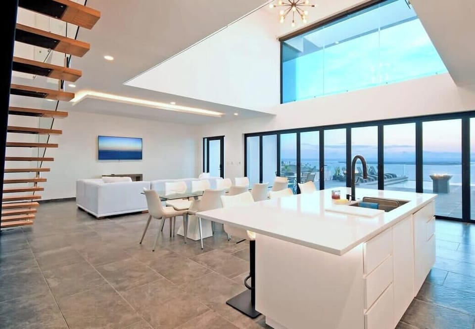 An open-concept design with a spacious kitchen and comfortable living room.