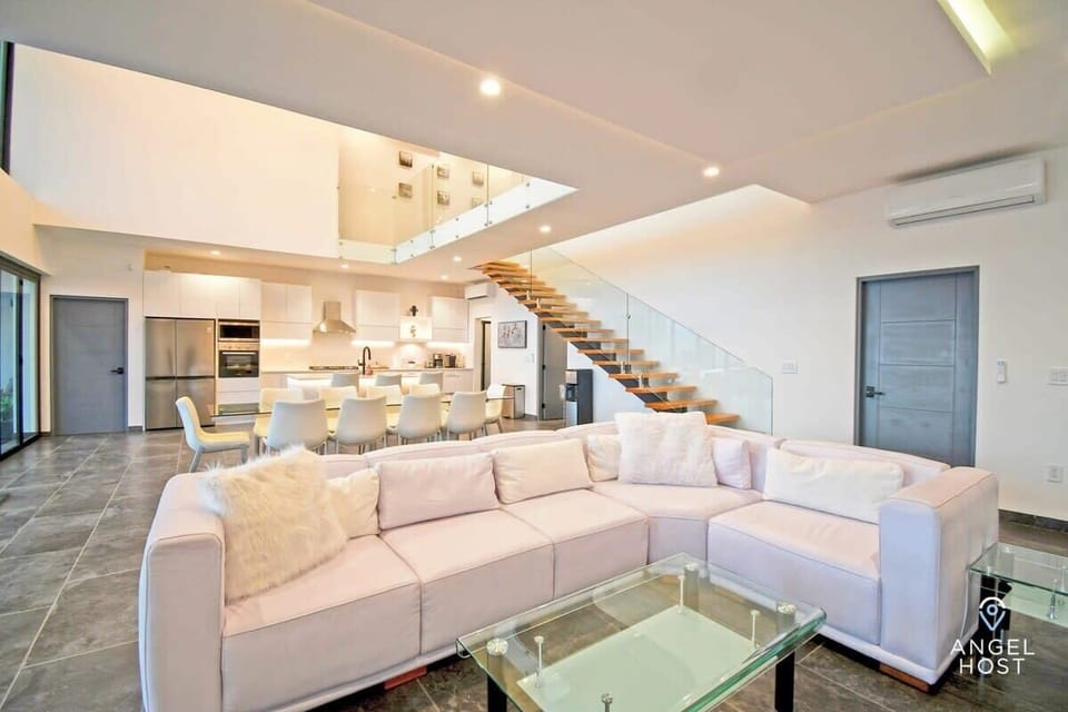 Relax on the spacious, comfortable sofa in the living room.