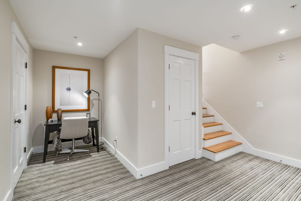 View of work space on lower level in primary suite
