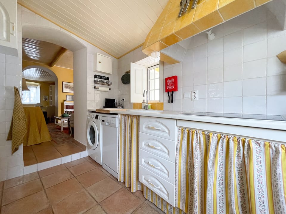 Kitchen and access to the living room