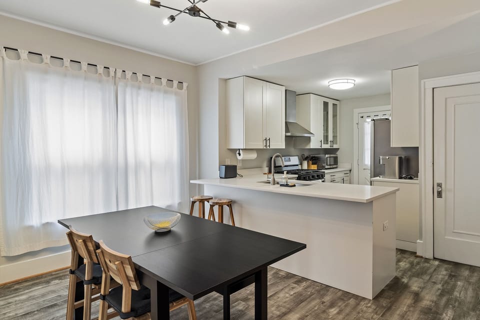 The dining area and kitchen flow seamlessly together.