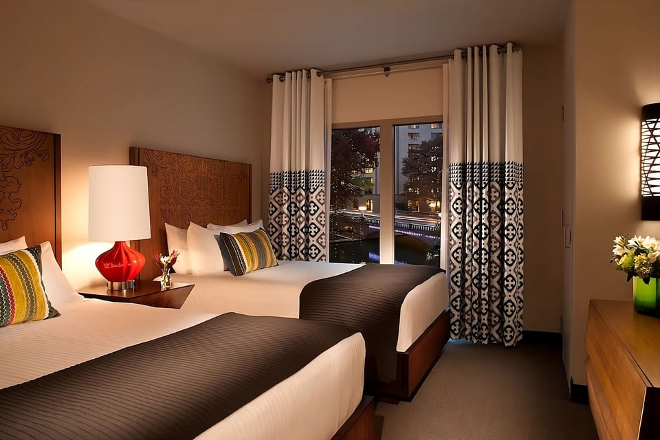 Rest easy in a softly lit room designed for two.