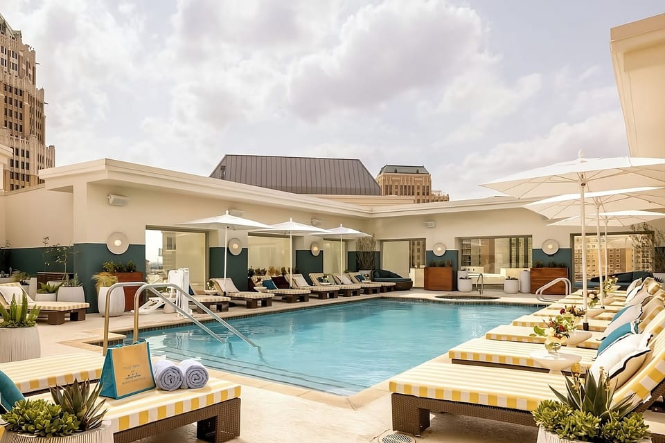 Soak up sunshine on chic loungers beside the sparkling pool.