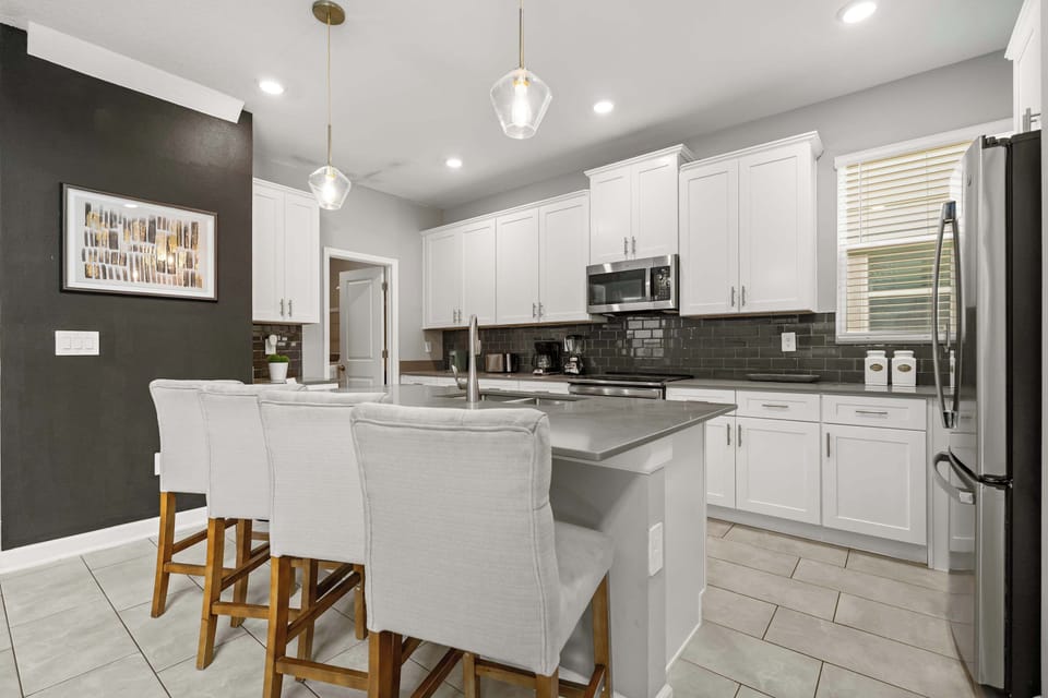 Fully equipped kitchen with stainless steel appliances and all the essentials.