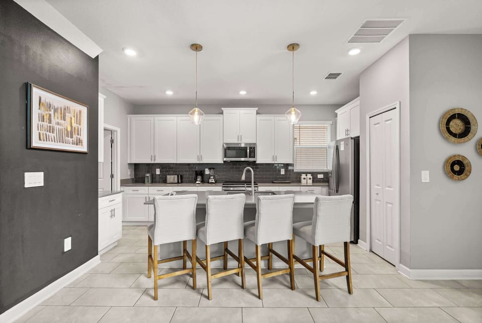 Kitchen island with bar seating — great for casual meals or conversations while cooking.