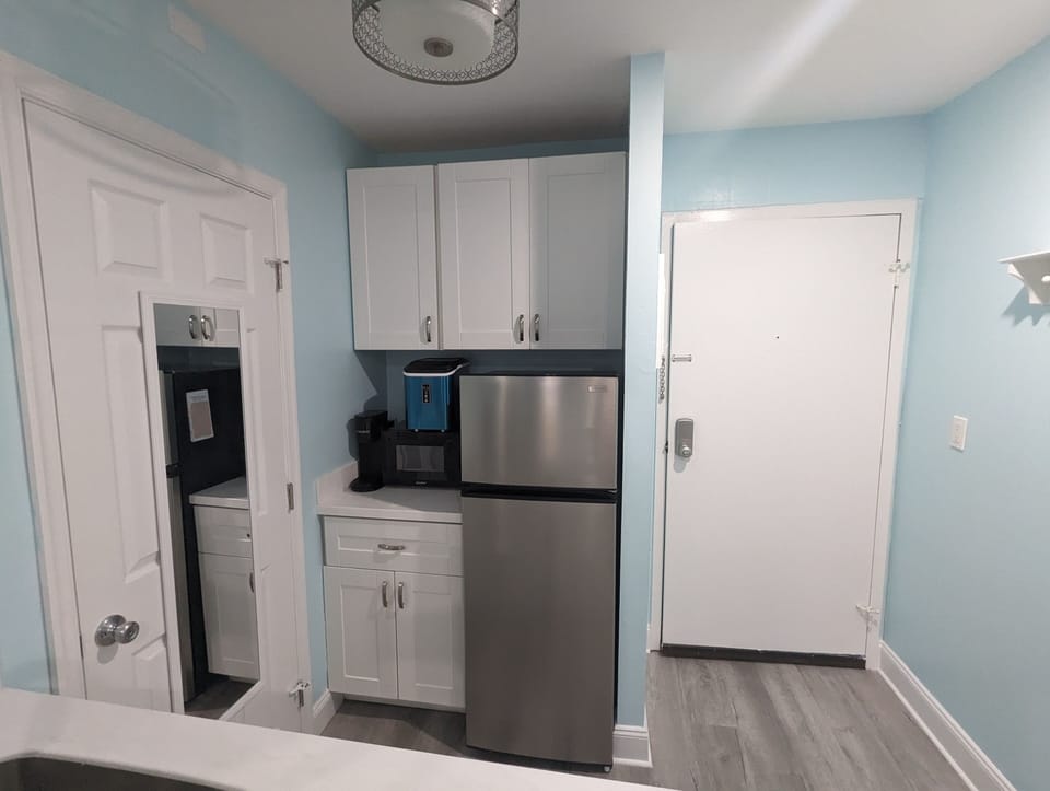 Kitchen, Frigerator, Dual Hot plate, Microwave, Ice Maker, & Keurig Coffee pot.