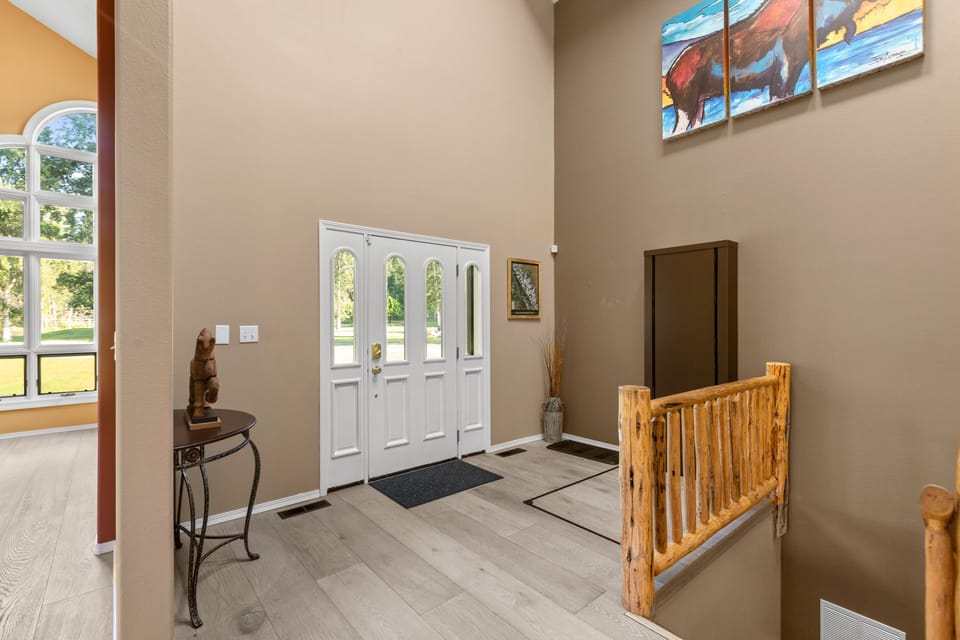 Front entry with elevator and stairs