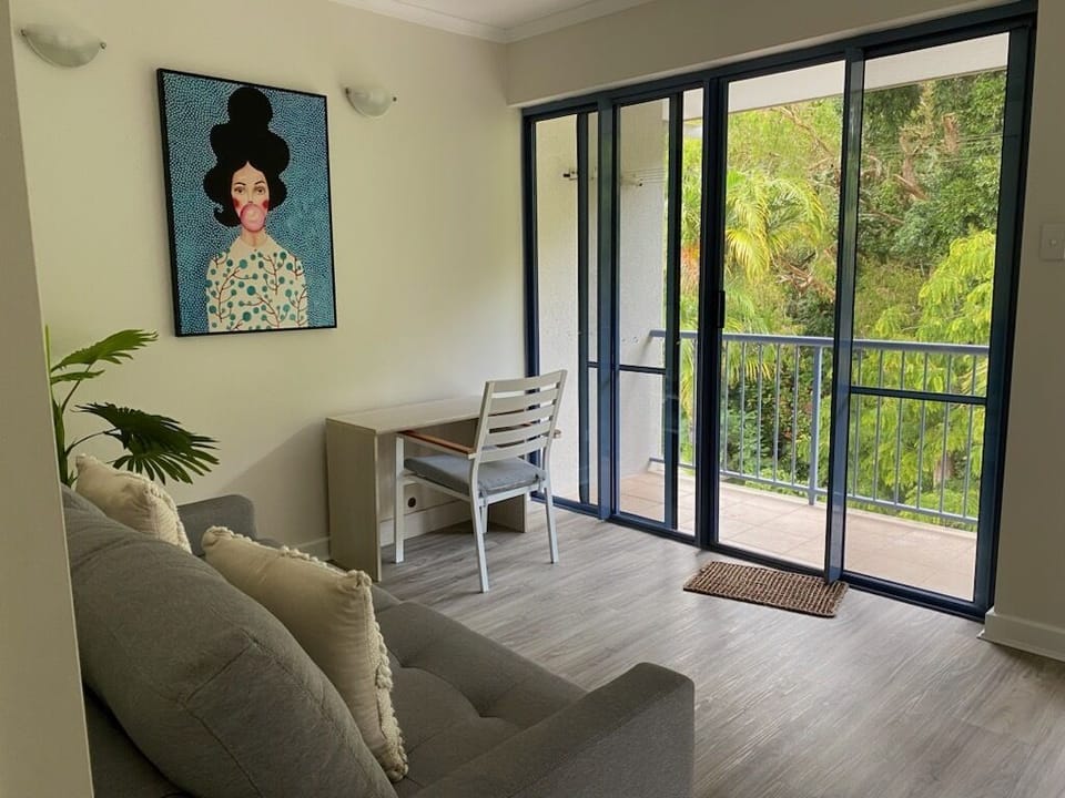 2 living room, facing the rainforest..with sofa bed