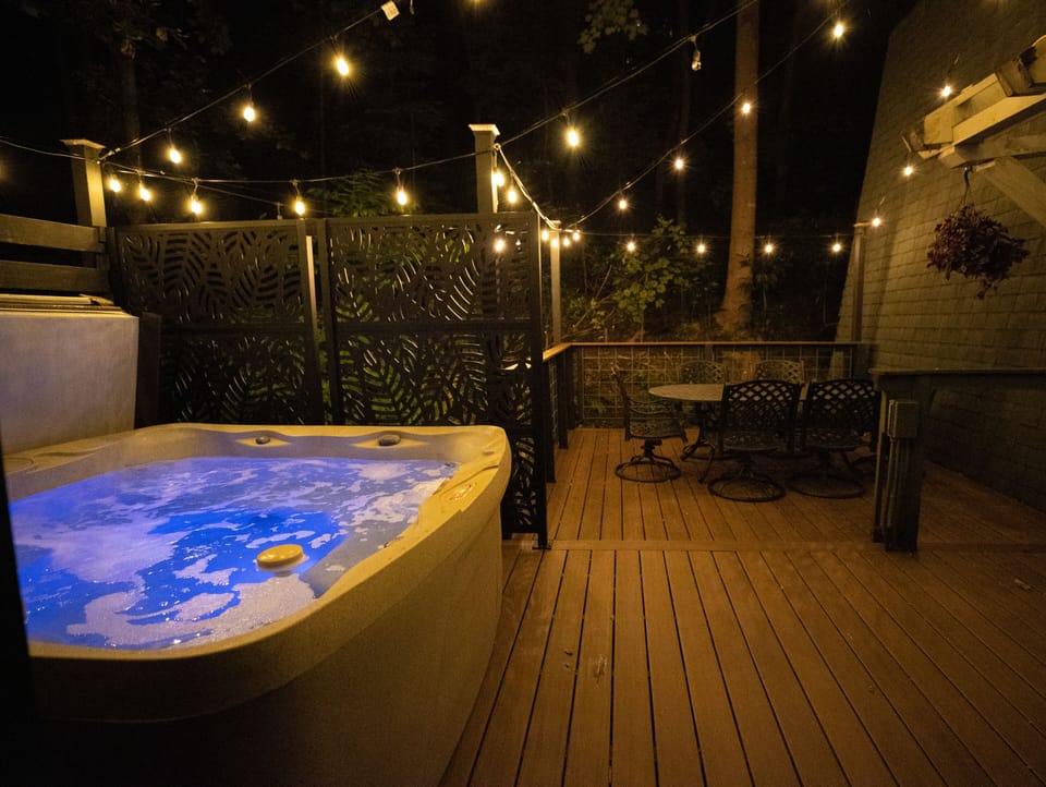 Hot tub 
2 dining seats, each sits 6