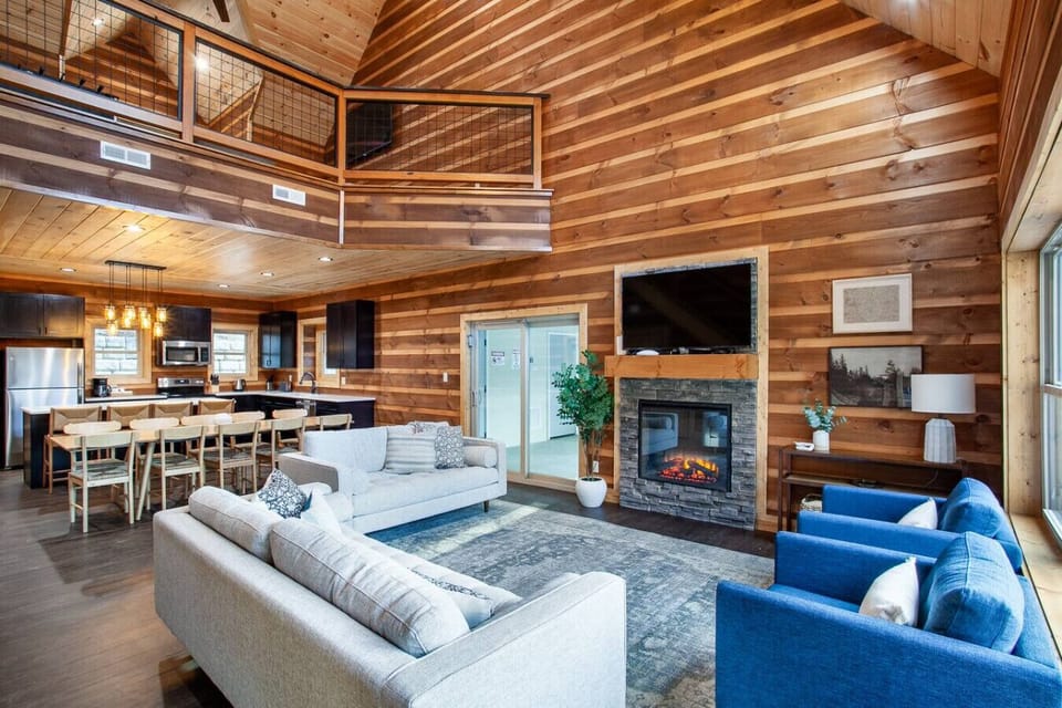 Modern open living, dining & kitchen! Great for socializing & entertaining! The indoor pool is just off of the living room!