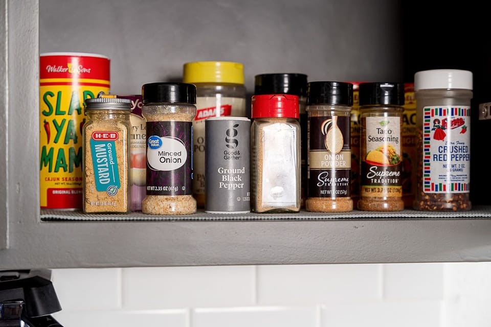 Many spices and cooking essentials for meal prep