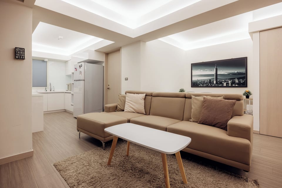 Comfy Living Room:
• 65” Smart TV 
• Open Space with Kitchen & Dining Area
