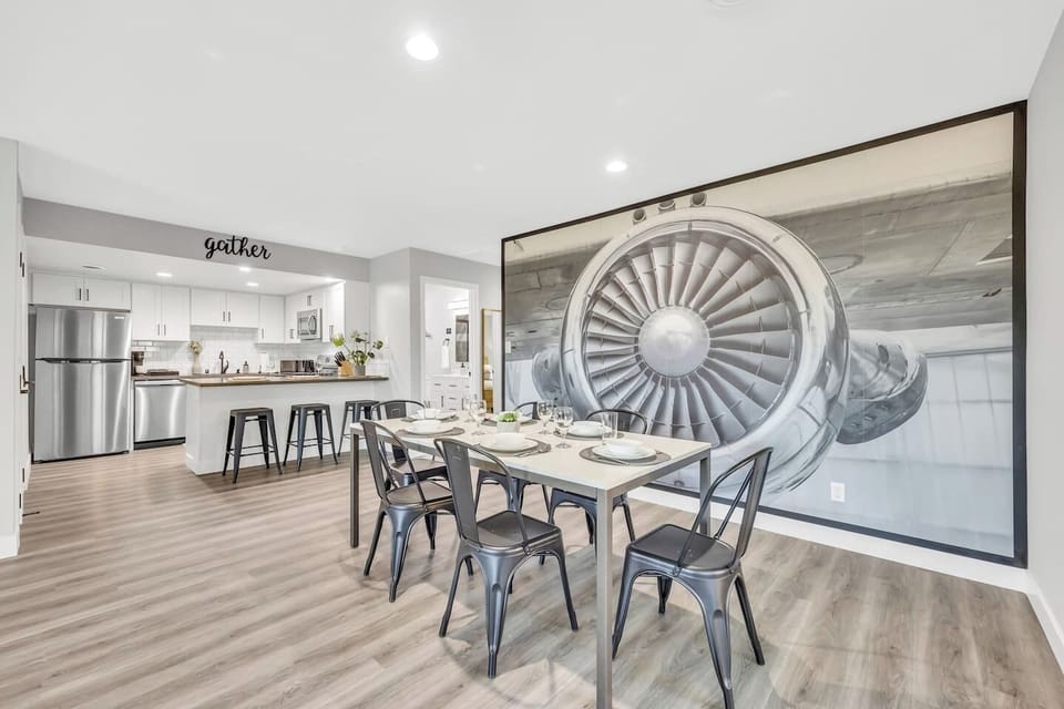 Open concept kitchen and dining with plenty of seating for all guesys