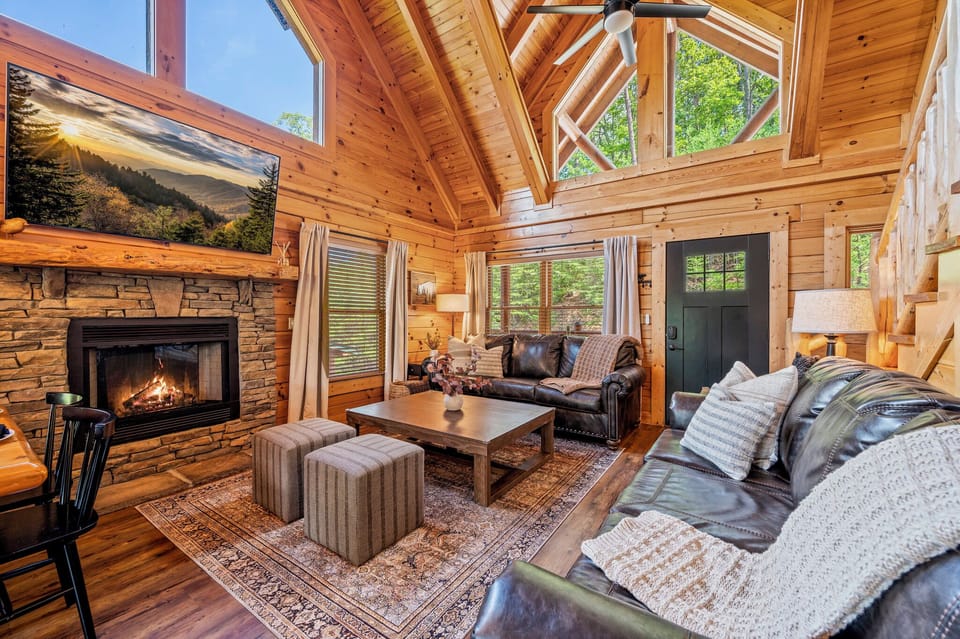 [main living room] Open-concept & thoughtfully designed with mountain views & a fireplace (electric)
