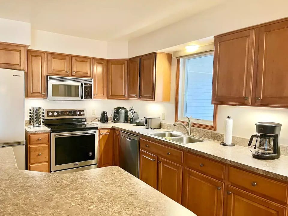 Enjoy a kitchen fully stocked with different kitchen amenities