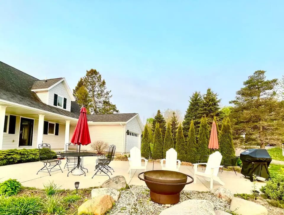 Patio with a Grill and a Firepit