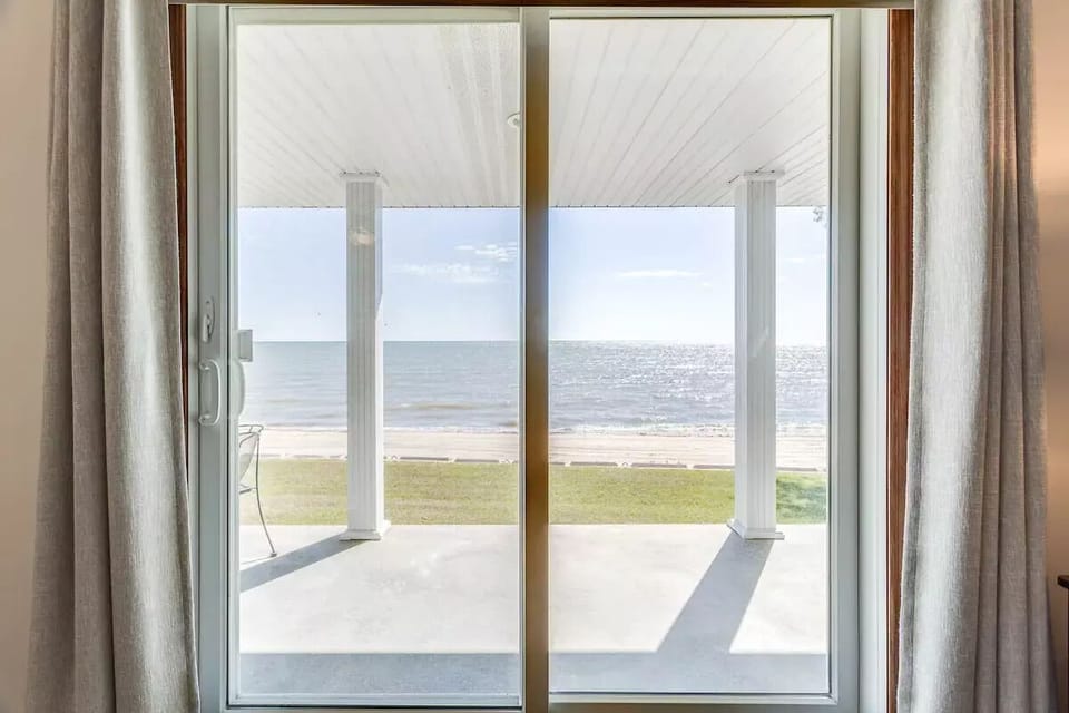 Enjoy stunning lake views right out of the living room or from a covered porch