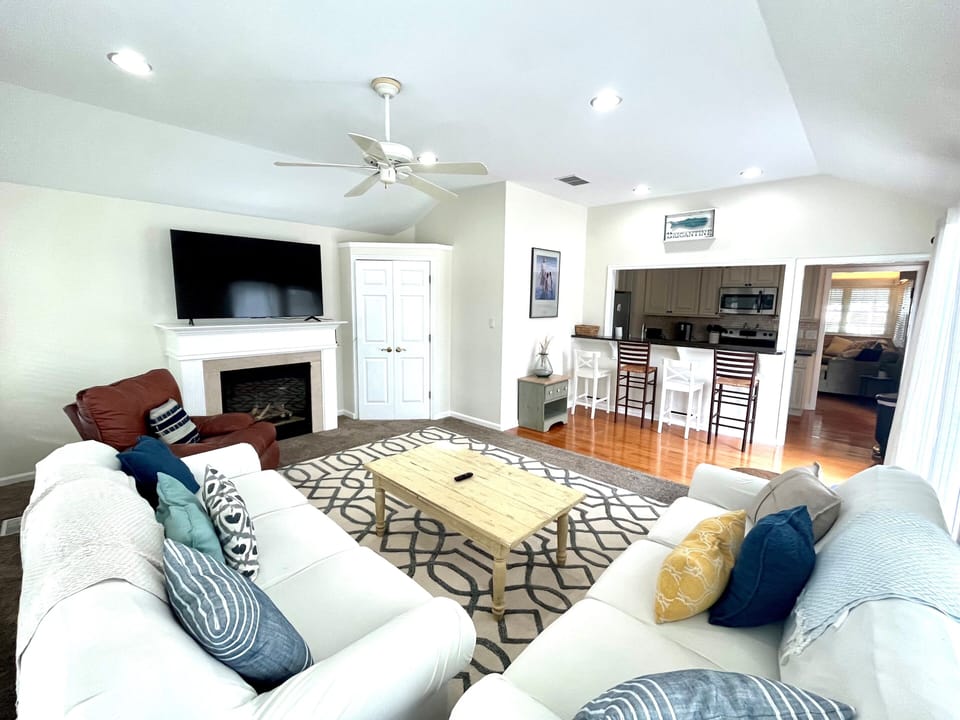 2nd living room off kitchen equipped with Smart 65inch Smart TV