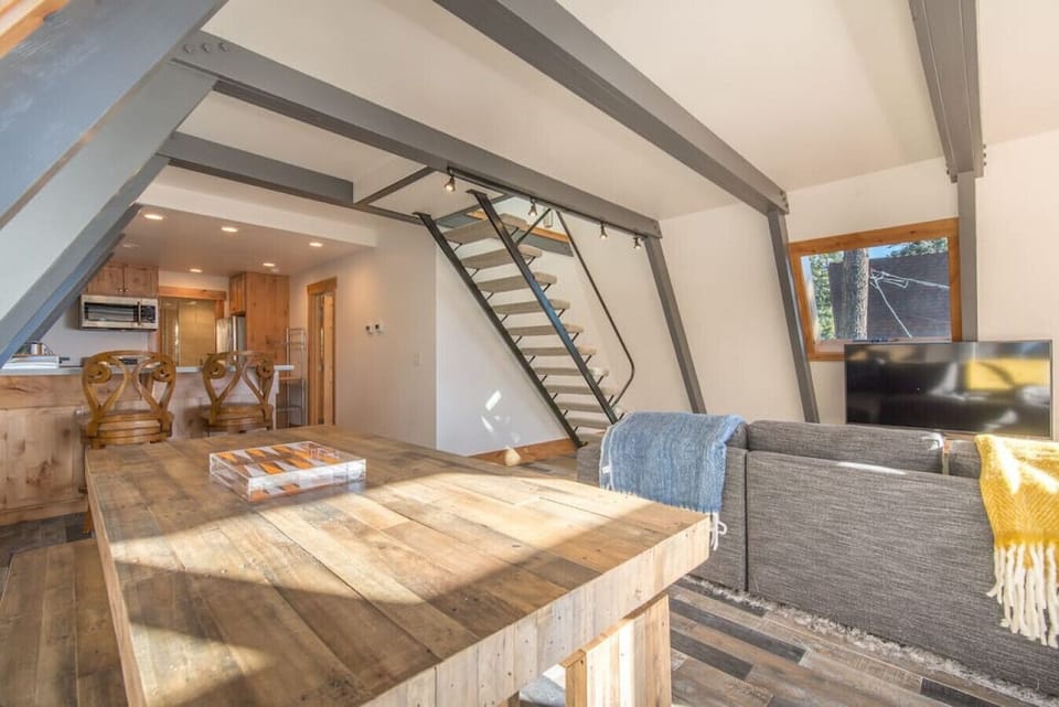 Open concept living / dining / kitchen with views of Lake Tahoe