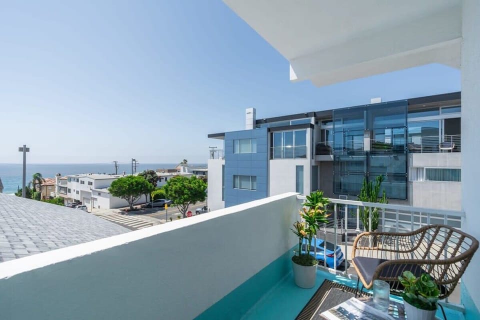 Unwind on the balcony and take in the stunning ocean views after a day at the beach.