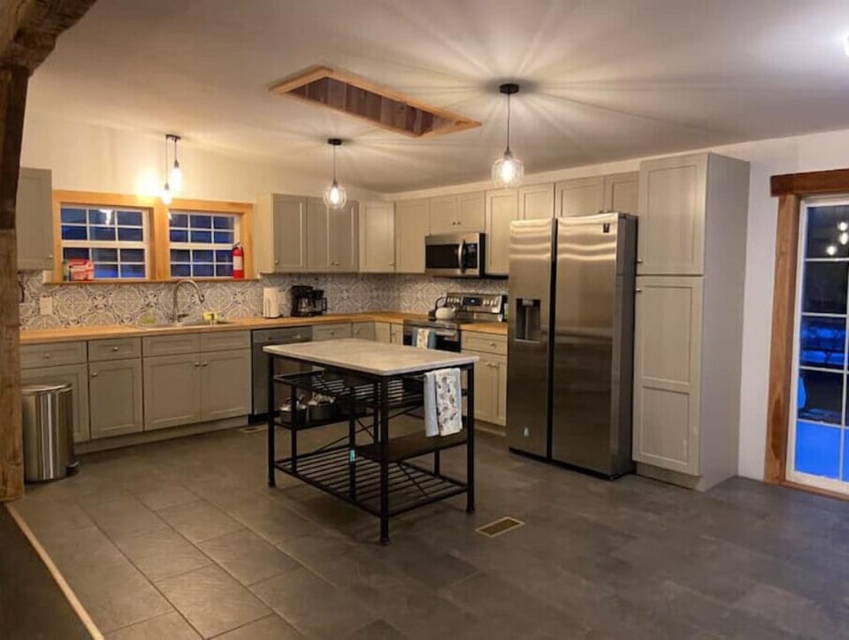 Large updated kitchen comes  w/ everything you need including spices and oils.