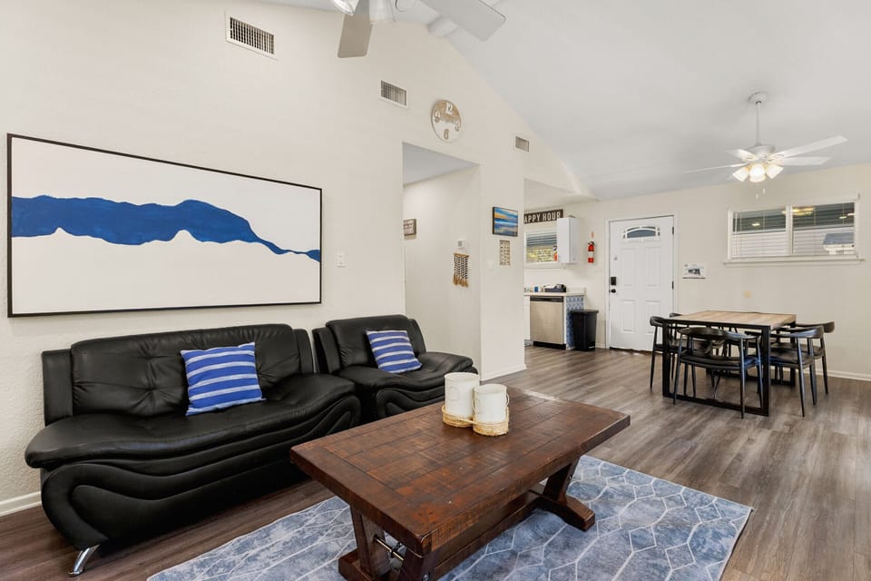 This open living space offers a relaxing setup for movie nights, family time, or cooling off after a day on the Guadalupe River.