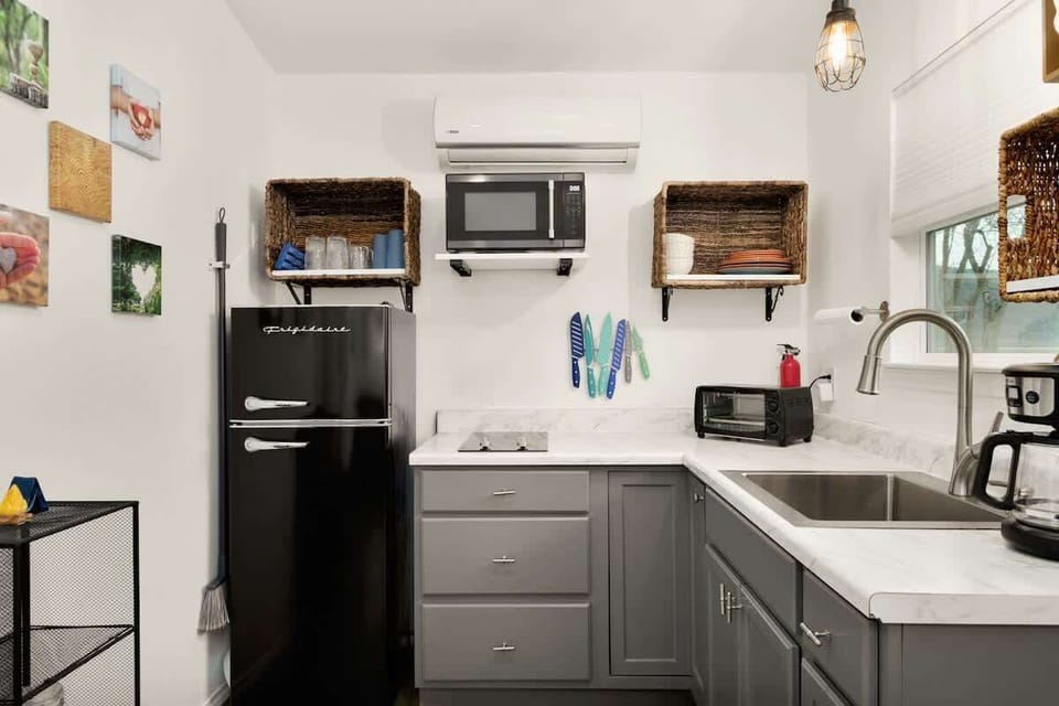 Well-equipped kitchenette with modern appliances, cookware, and everything needed for easy, comfortable meals during your stay.
