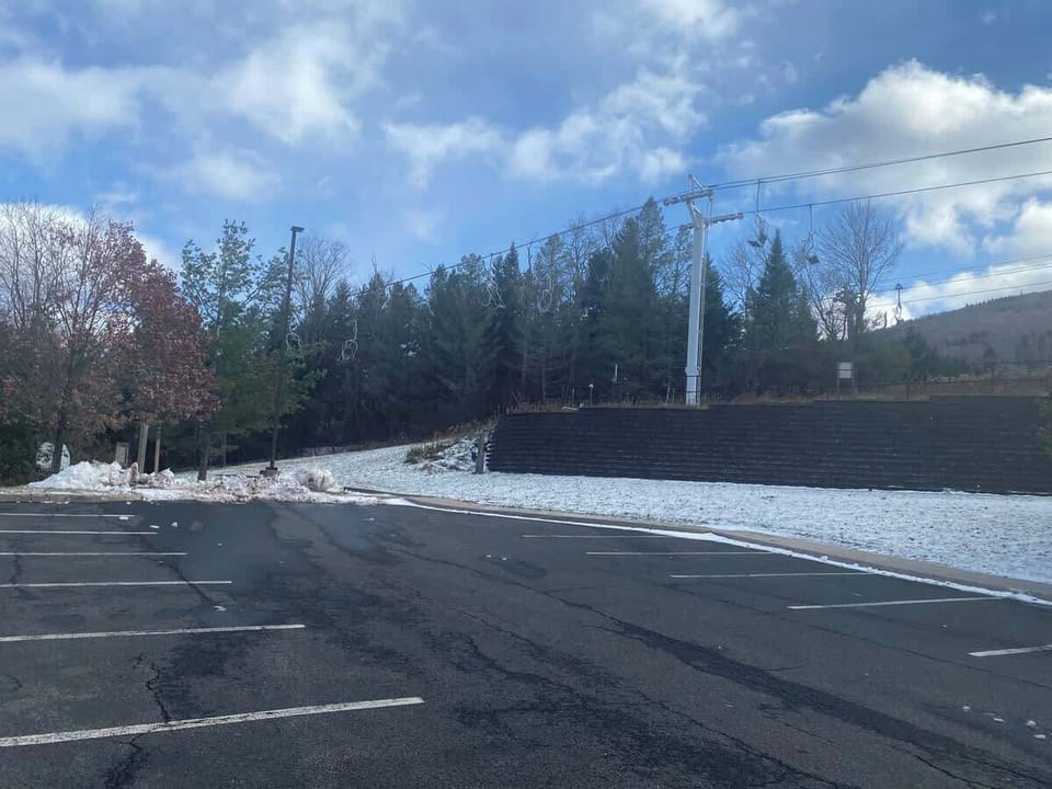 Spacious parking lot fully paved. 