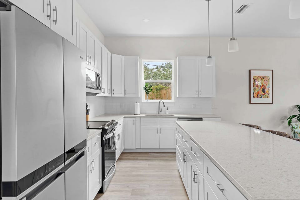 Spacious, stylish, and fully stocked—perfect for whipping up your favorite meals. - The Seafoam - Panama City Beach, FL