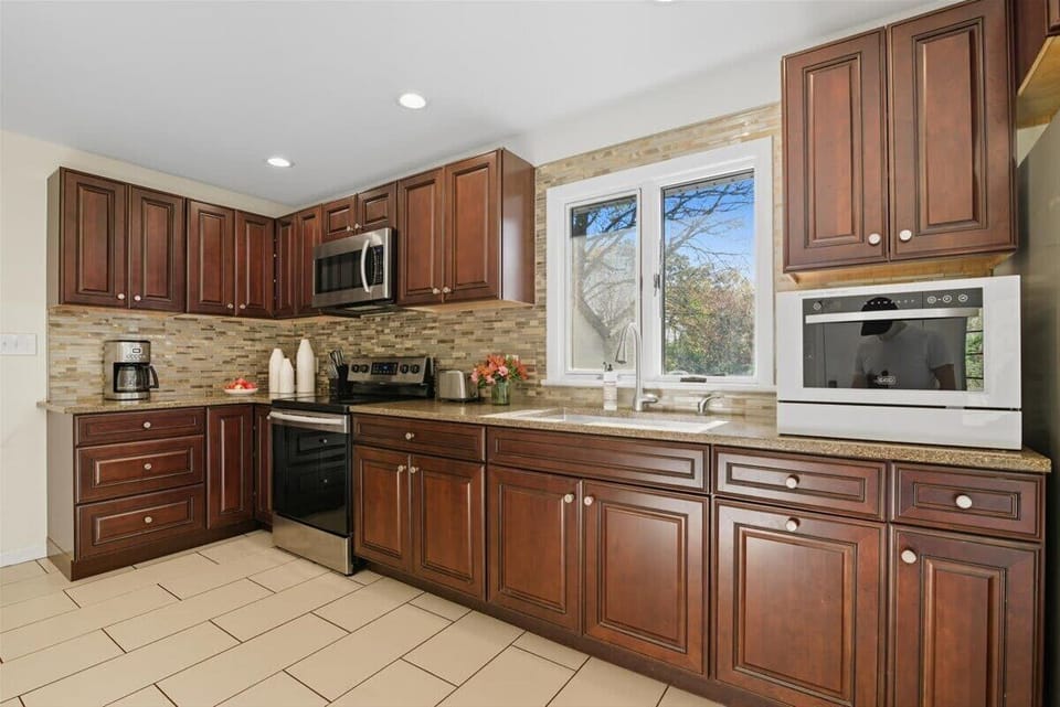 Fully stocked kitchen, complete with a countertop dishwasher for your ease and convenience while on family vacation! - The Coolbaugh - East Stroudsburg, PA