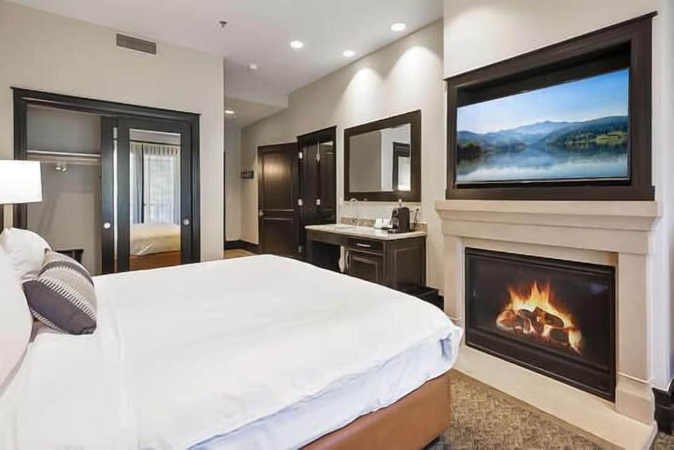 Primary king bedroom #1 with Fireplace and TV