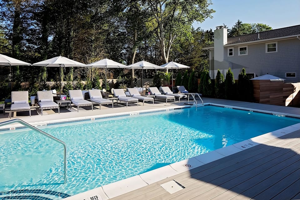 Soak up the sun poolside with loungers and sparkling water.