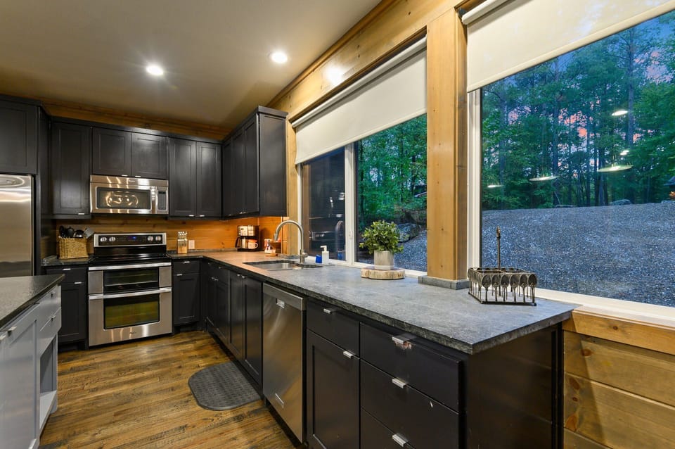 Oven, microwave, stove and dishwasher.