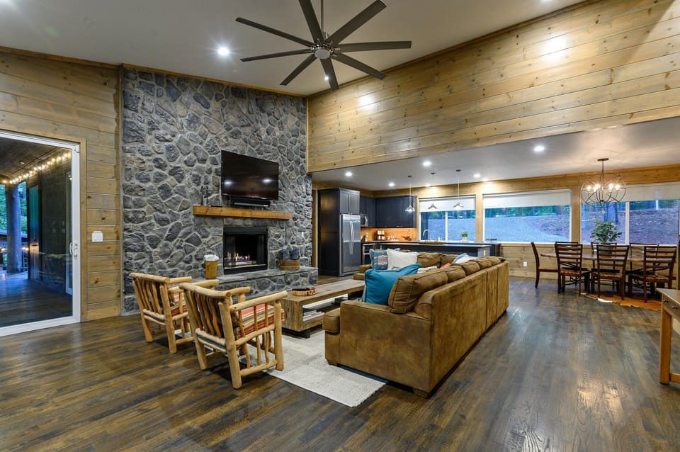 Oversized sectional and lounge seating around the fireplace!