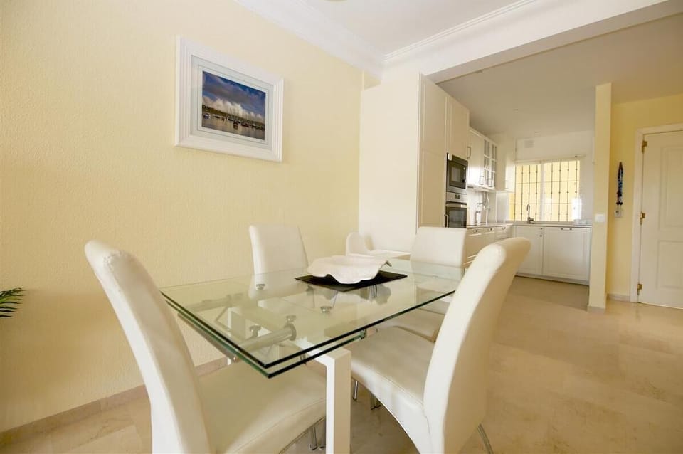 Modern dining area with space for four guests