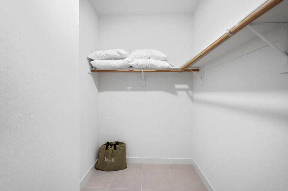 Organized closet space w/ shelving & hanging room for longer stays