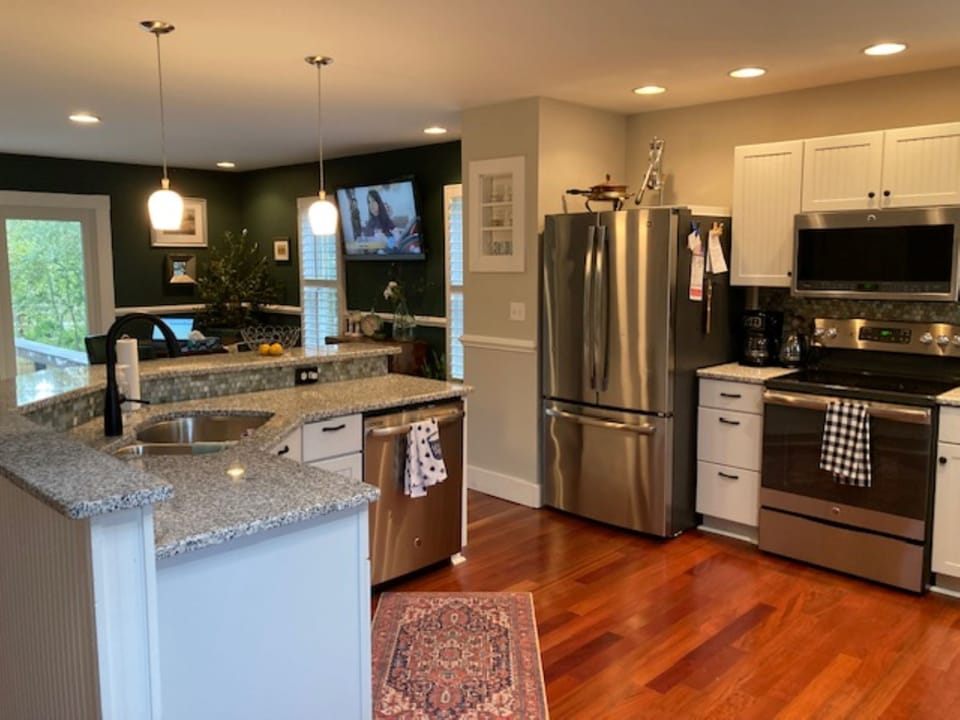 Full kitchen includes toaster, drip coffee maker and electric tea kettle.