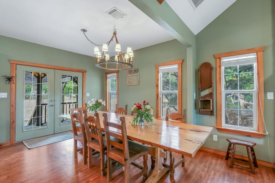 Grand dining table with plenty of room for guests to enjoy a meal together