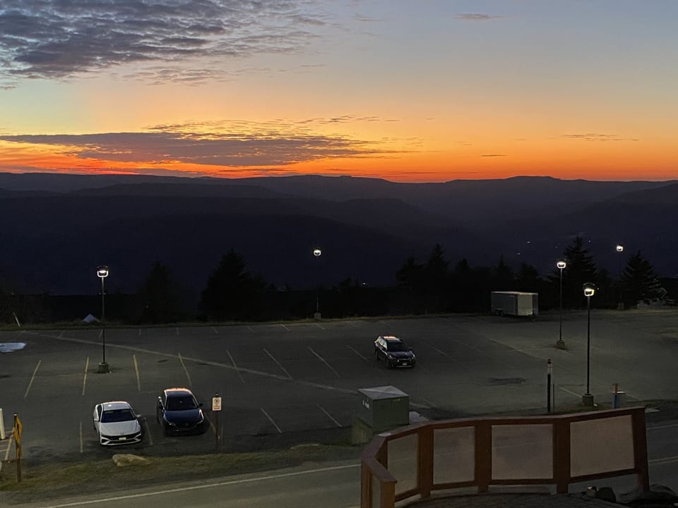 Sunset view from condo unit balcony