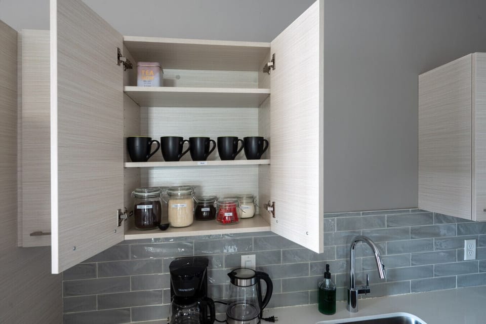 Coffee station with organic coffee, organic cane sugar, black tea, creamer and decaf coffee