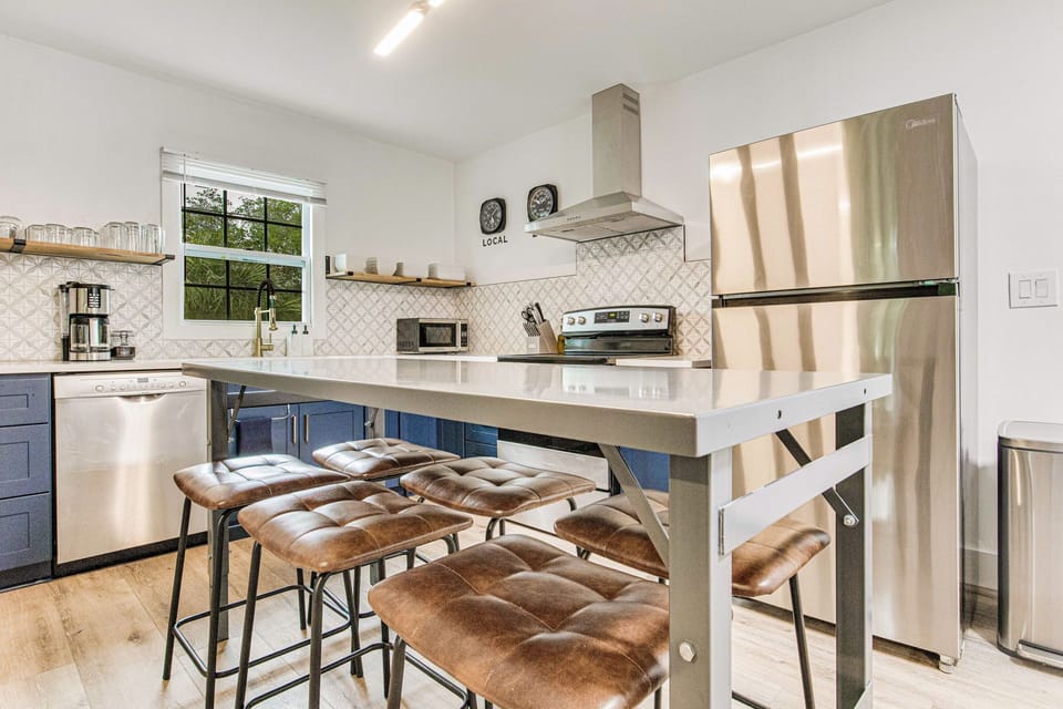 Stainless steel appliances and soft-close cabinets. 