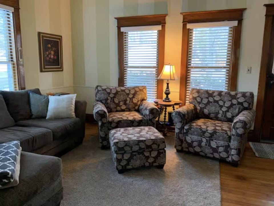 Main living room w/ TV, Roku and DVDs.