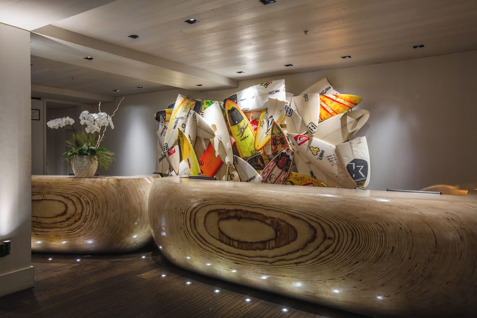 Feel instantly welcomed by warm lighting and coastal-inspired decor.